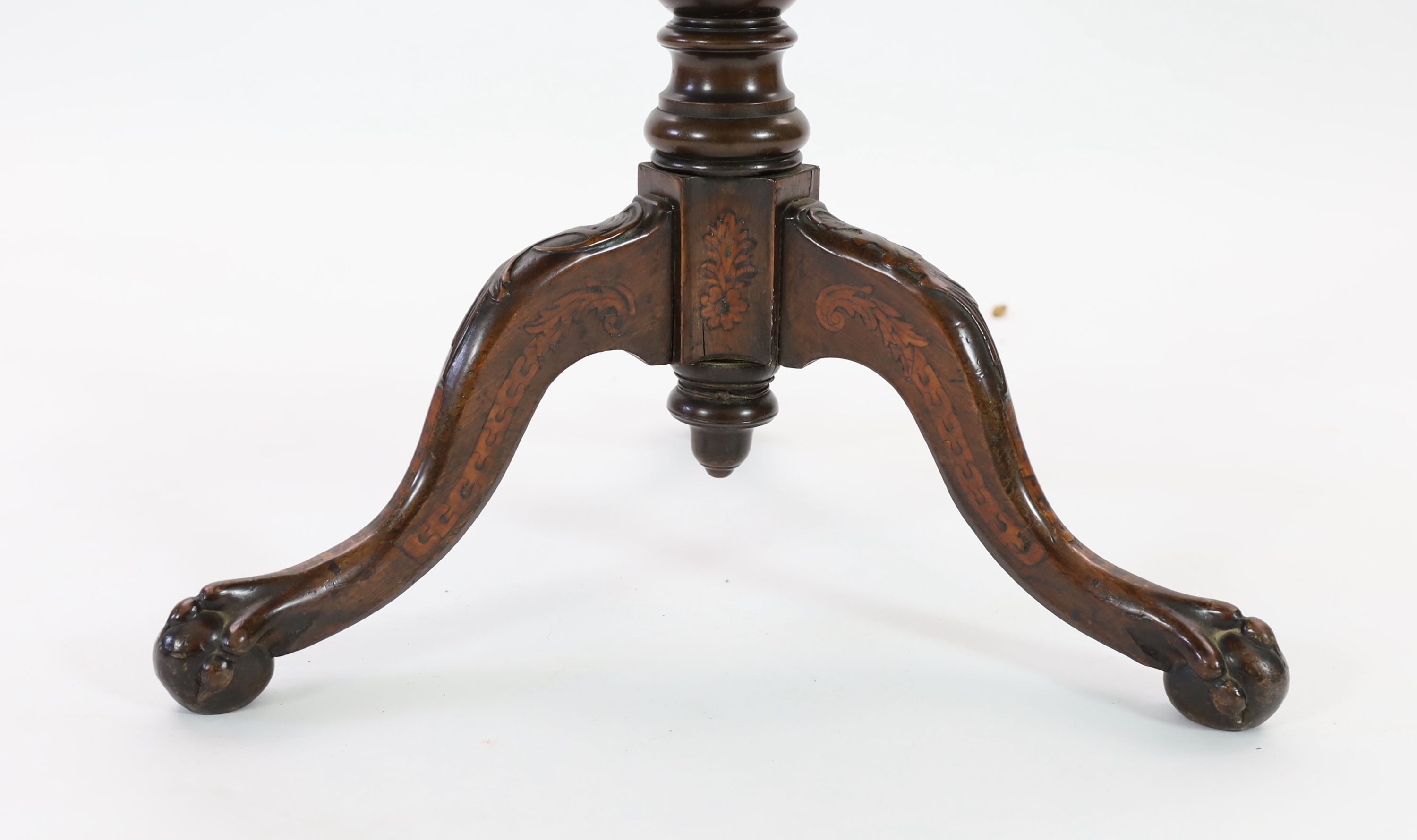 A mid to late 18th century Dutch marquetry inlaid walnut tripod table, Diam.83cm H.72cm